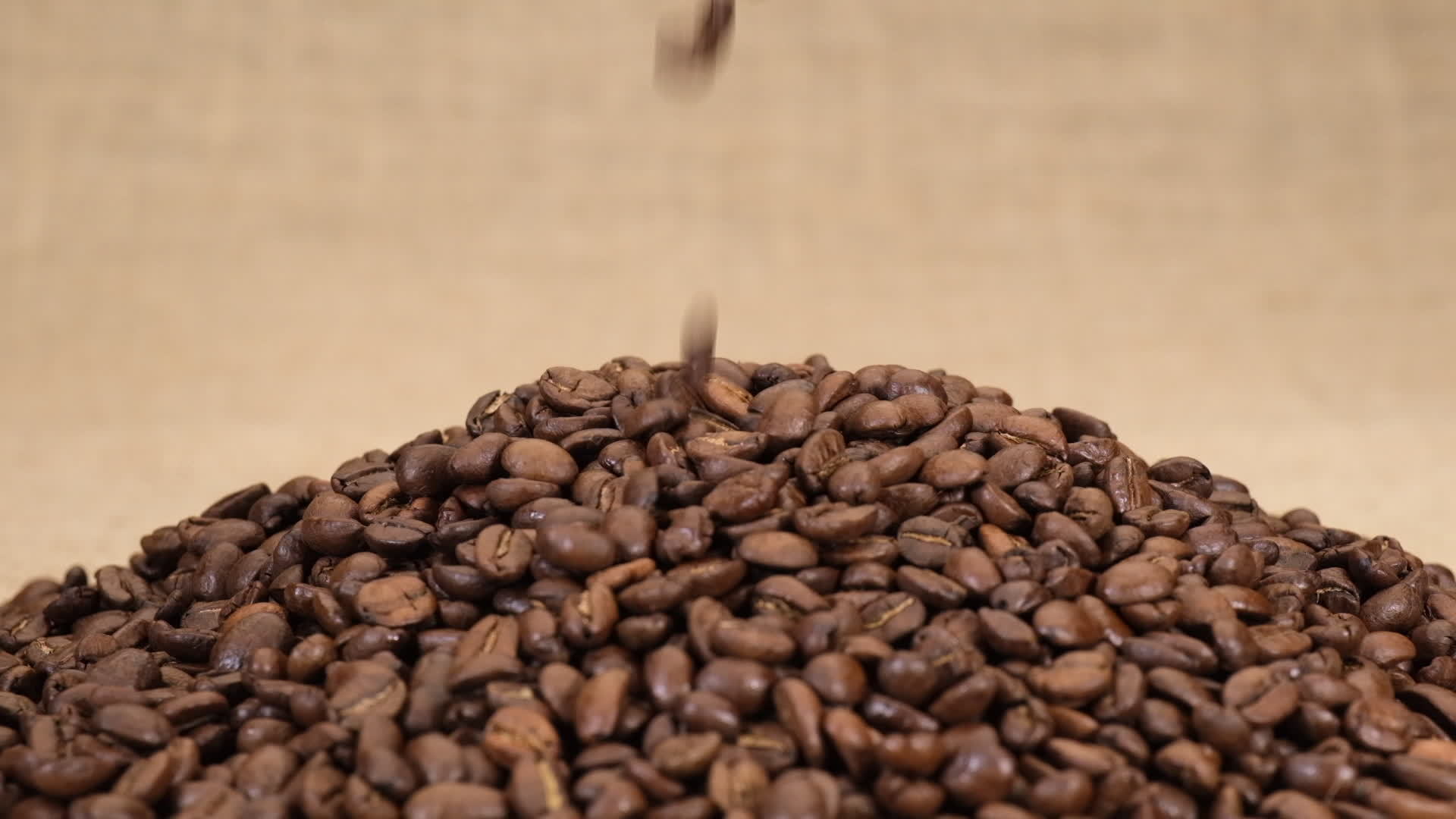 Coffee beans falling at slow motion 15505391 Stock Video at Vecteezy