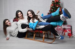 Young girls with sleigh photo