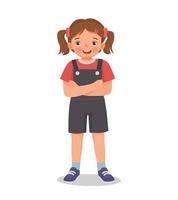 cute little girl standing with arms crossed pose vector