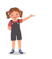 cute little girl showing presenting with hand making welcome gesture vector