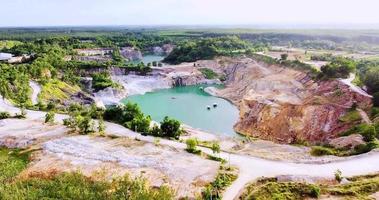 A large hole formed by mining, the view is quaint and beautiful. mining industry concept video