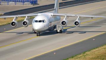 FRANKFURT AM MAIN, GERMANY JULY 19, 2017 - British Aeroapace 146 Avro RJ85 taxiing after landing on runway 25R. Fraport, Frankfurt, Germany video