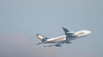 AMSTERDAM, THE NETHERLANDS JULY 26, 2017 - Singapore Airlines Cargo Boeing 747 climbing up after departure at Aalsmeerbaan 18L, Shiphol Airport, Amsterdam, Holland video