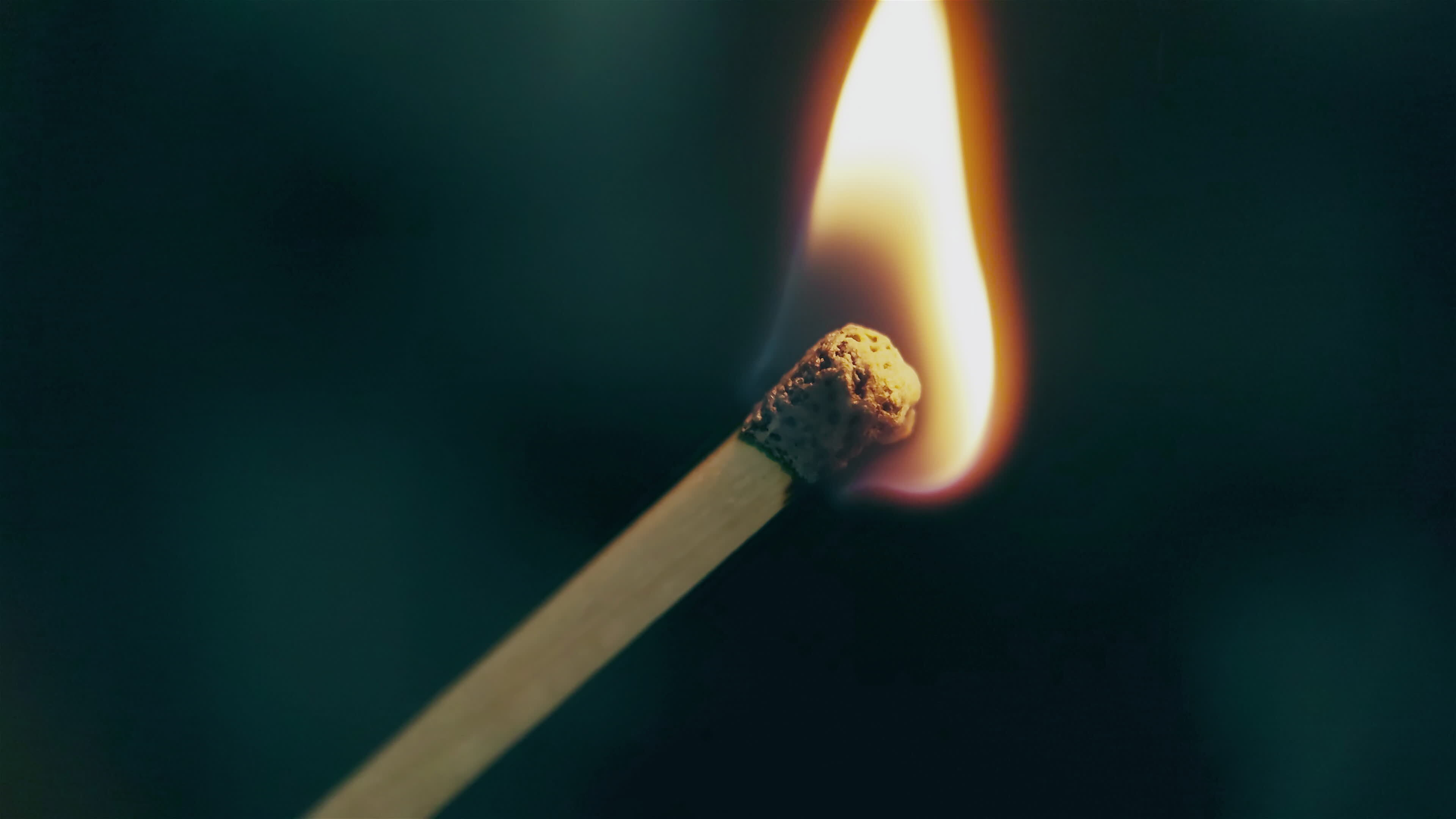 Macro shooting of a burning match head 15530110 Stock Video at Vecteezy
