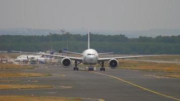 FRANKFURT AM MAIN, GERMANY JULY 20, 2017 - Cathay Pacific Boeing 777 B KPU towing from service. Fraport, Frankfurt, Germany video