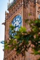 Close up view of the Big Ben clock tower and Westminster in London. photo