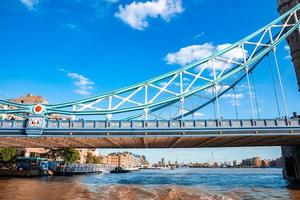 Iconic Tower Bridge connecting Londong with Southwark on the Thames River photo