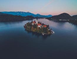 Drone views of the Pilgrimage Church of the Assumption of Maria in Bled, Slovenia photo