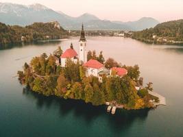 Drone views of the Pilgrimage Church of the Assumption of Maria in Bled, Slovenia photo