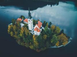 Drone views of the Pilgrimage Church of the Assumption of Maria in Bled, Slovenia photo