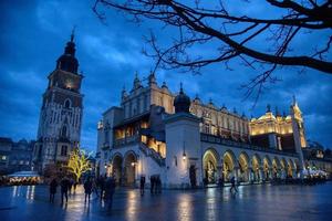 The Cloth Hall and Town Hall tower in Krakow, Poland photo
