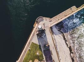 Lighthouse on the coastline in Helsinborg, Sweden photo