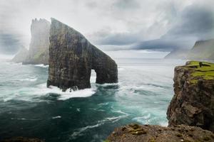 Drangarnir and Tindholmur in the Faroe Islands photo