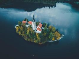 Drone views of the Pilgrimage Church of the Assumption of Maria in Bled, Slovenia photo
