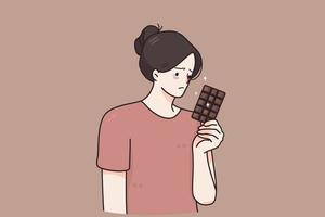 Nutrition, restrictions, diet concept. Sad unhappy young woman cartoon character standing with chocolate in hand tired of diet restrictions feeling guilty vector illustration