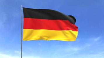 Wehende Flagge von Deutschland auf blauem Himmelshintergrund