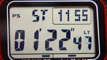 Macro close up of a tactical digital watch face functioning video