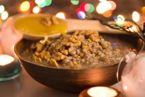 Christmas kutia from wheat, raisins and nuts, selective focus photo