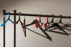 Stylish hallway interior with mirror and hanger stand photo