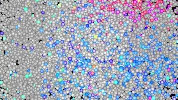 renderização digital de fundo abstrato de esferas vibrantes de brilho video