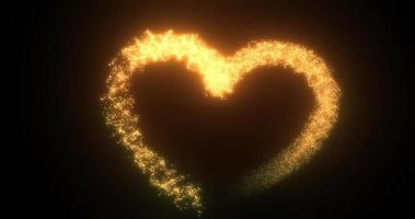 Golden yellow heart love glowing shiny for valentine's day holiday from magic energy lines and particles on black background. Abstract background photo