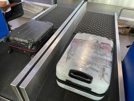 luggage on delivery at the airport after landing photo