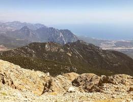 mountains against the blue sky. grass and bushes grow on the mountain. leisure. hiking trails on the mountain, recreation at high altitude photo