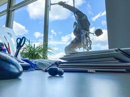 portrait of worker washing windows of the modern building. photo