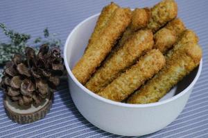 Chicken finger nuggets or chicken nuggets in the form of sticks photo