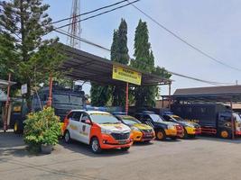 Central Java, Indonesia in October 2022. A collection of police cars are parked in the special vehicle parking lot belonging to the Jepara Police. photo