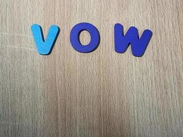 The arrangement of blue letters that read VOW photo