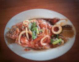 Blur photo or defocused photo of sweet and sour fried carp