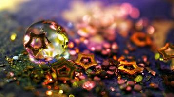 Macro Shot Of Water Drop On Glitter In Karachi Pakistan 2022 photo