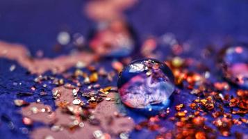 Macro Shot Of Water Drop On Glitter In Karachi Pakistan 2022 photo