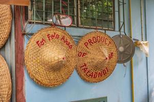 Straw hat Shop the Product of talad noi.Talad Noi Talat Noi, one of the oldest neighbourhoods in Bangkok, is filled with historic temples, charming shop houses photo