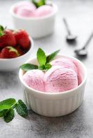 Homemade strawberry  ice cream with fresh strawberries photo