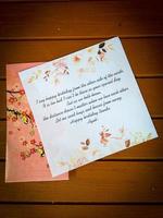 romantic birthday letter on brown table photo