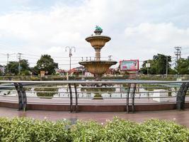 Probolinggo,Indonesia. Nov. 2022 - fountain at the roundabout in the city of Probolinggo Indonesia in the afternoon with plants around it photo