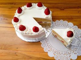 strawberry shortcake on a wooden table photo