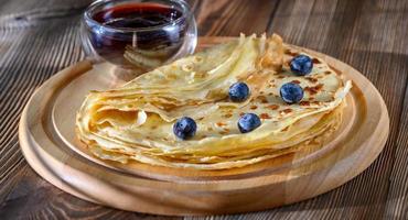 Crepes with fresh blueberries photo