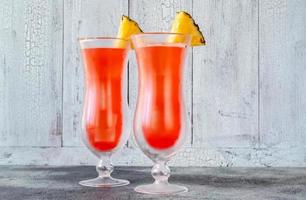 Two glasses of Singapore Sling photo