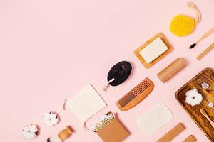 Zero waste accessories on pink background. photo