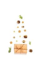 Christmas card. Christmas background with gift, pine cones, branches, gold toys. photo