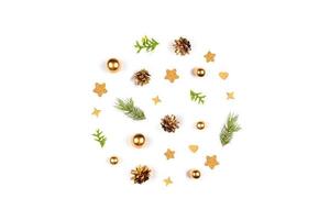 Christmas card. Christmas background with gift, pine cones, branches, gold toys. photo