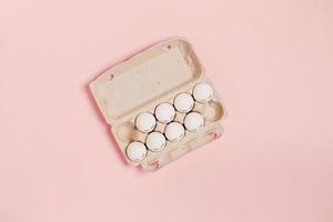 Eggs on a pink background. photo