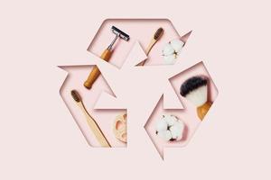 Zero waste accessories on pink background. photo