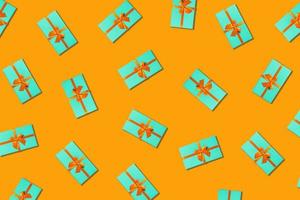 Orange background with mint boxes. photo