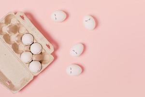 Eggs on a pink background. photo