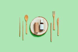 Flat lay with wooden cutlery. photo