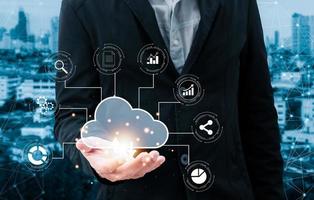 man holding cloud computing diagram show on hand. Data storage.Cloud technology.Secure backup and consistency  Networking and internet service concept.Implementing storage technology in business photo